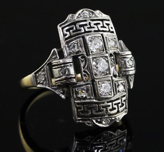 An Art Deco style platinum, yellow gold and diamond set tablet ring, size L.